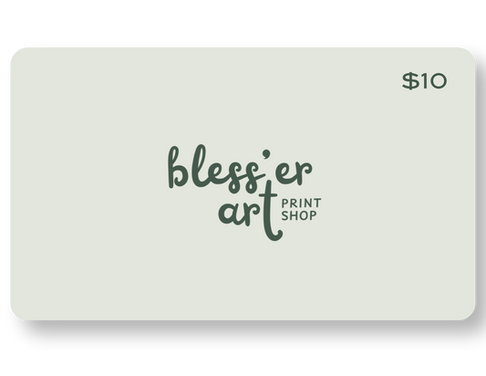 A $10 gift card for Bless'er Art Print Shop with a pale sage green background and dark green logo text, shown on a white background with a soft drop shadow.